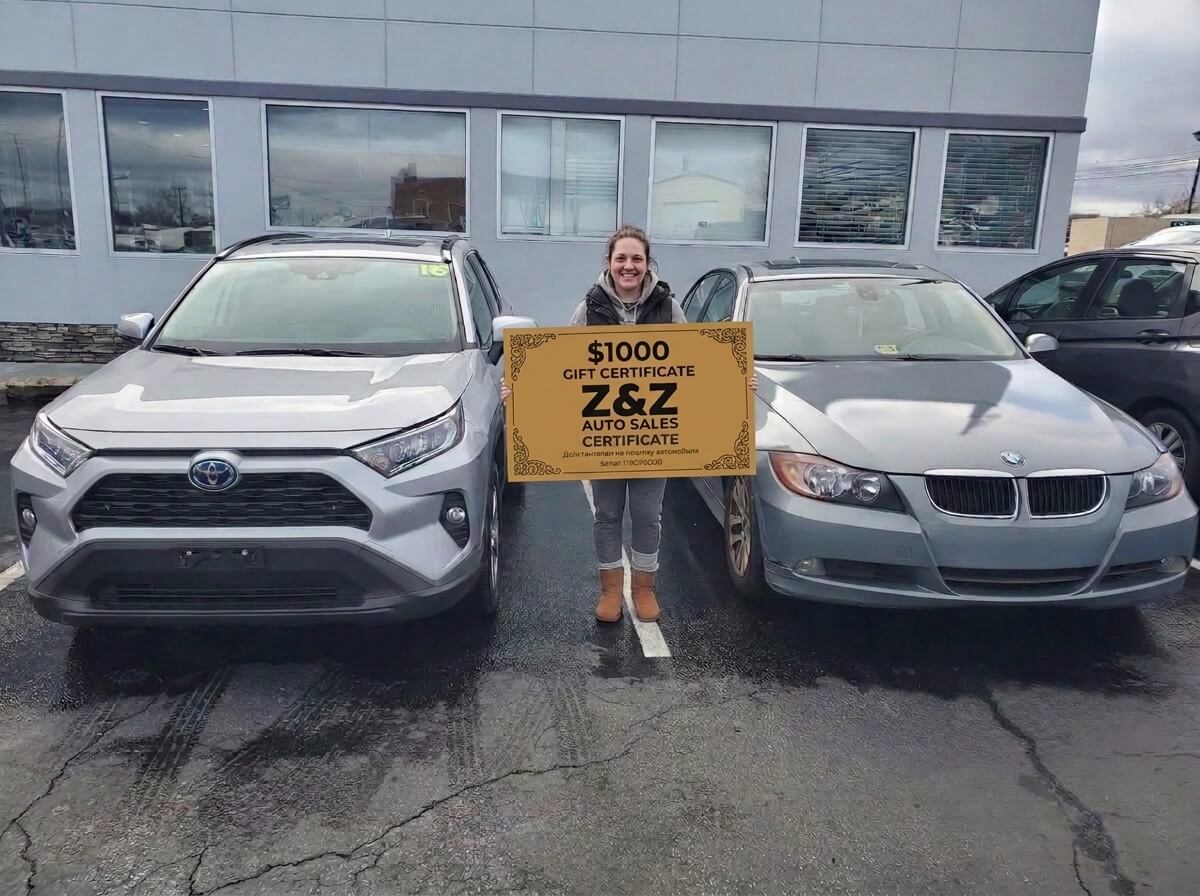 Sarah Mitchell with her new SUV at ZZ Auto Sales